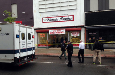 Photo of RPD investigating a robbery and homicide at Victoria Jewelers