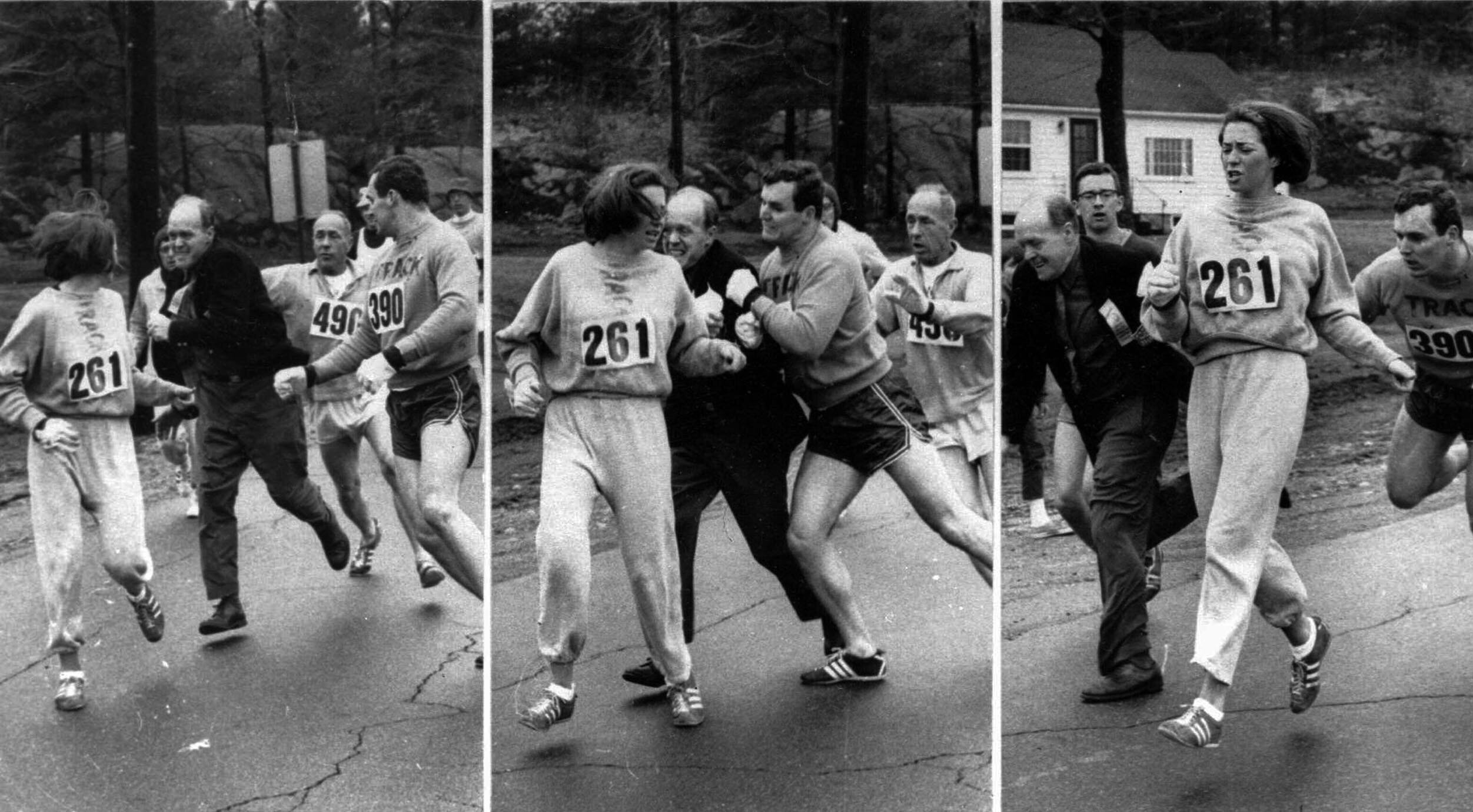 Photo credit: AP Images. Original caption: "Hopkinton, Mass, April 19, 1967: Who says chivalry is dead? When a girl listed as 'K. Switzer from Syracuse' found herself about to be thrown out of normally all-male Boston Marathon today, husky companion Thomas Miller of Syracuse threw block that tossed race official out of the running instead. Sequence show Jock Semple, official, moving in to intercept Miss Switzer, then being bounced himself by Miller. Photos by Harry Trask of Boston Traveler."